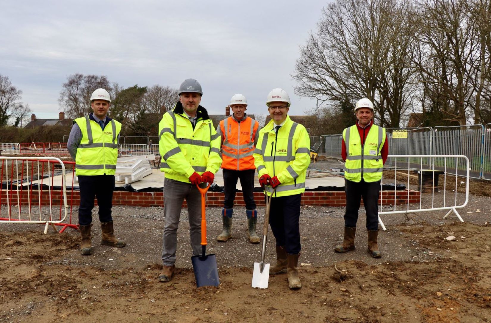1. From left, site manager Leon Calder, Flagship Homes senior project manager Stephen Jones, contracts manager Neil Hesketh, Lovell regional managing director Simon Medler, and assistant manager Steve Green at Picture House Green in Leiston, Suffolk